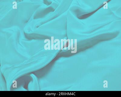 Blue rippling fabric. Stock Photo
