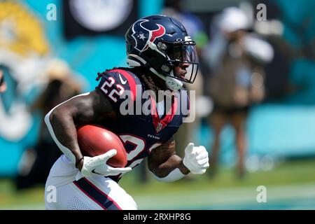 Houston Texans running back Mike Boone (22) warms up during pregame of an  NFL pre-season football game against the New England Patriots, Thursday,  Aug. 10, 2023, in Foxborough, Mass. (AP Photo/Greg M.