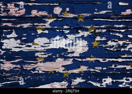 Flag of the European Union painted on a grunge wooden board. Stock Photo