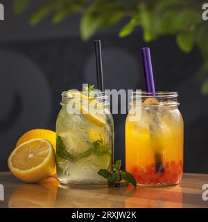 Fresh delicious lemonades in a jar. Ideas for summer cocktails. Stock Photo