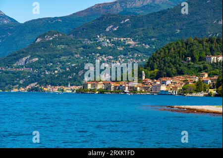 The town of Bellagio, and in the background the town of Varenna, on Lake Como. Stock Photo