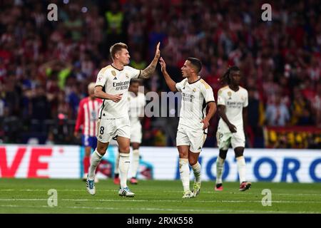 Toni Kroos of Real Madrid Cf celebrates with his team mate Lucas Vazquez after scoring a goal during the La Liga match beetween Club Atletico de Madrid and Real Madrid CF at Civitas Metropolitano Stadium on September 24, 2023 in Madrid  Spain . Stock Photo