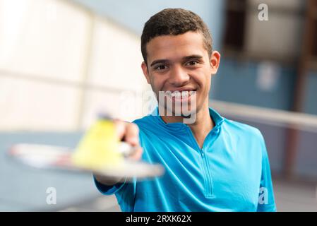 bearded badminton player in sport outfit Stock Photo