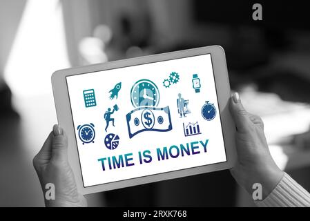 Time is money concept shown on a tablet held by a woman Stock Photo