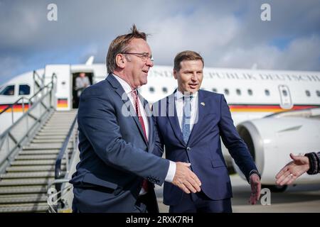 26 September 2023, Estonia, Ämari: Boris Pistorius (l, SPD), Federal Minister of Defense, is received by his Estonian counterpart Hanno Pevkur at the Ämari Airbase. After Latvia, Pistorius will also visit neighboring Estonia until Sept. 27, 2023. Photo: Kay Nietfeld/dpa Stock Photo