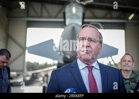 26 September 2023, Estonia, Ämari: Boris Pistorius (SPD), Federal Minister of Defense, gives a press statement in front of a Spanish Eurofighter at the Ämari Airbase. After Latvia, Pistorius will also visit neighboring Estonia until Sept. 27, 2023. Photo: Kay Nietfeld/dpa Stock Photo