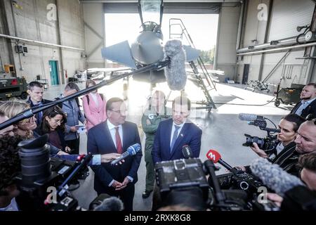 26 September 2023, Estonia, Ämari: Boris Pistorius (l, SPD), Federal Minister of Defense, gives a press statement with his Estonian counterpart Hanno Pevkur in front of a Spanish Eurofighter at the Ämari Airbase. After Latvia, Pistorius will also visit neighboring Estonia until Sept. 27, 2023. Photo: Kay Nietfeld/dpa Stock Photo