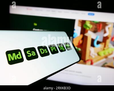 Smartphone with logo of software product Adobe Substance 3D on screen in front of company website. Focus on center-left of phone display. Stock Photo