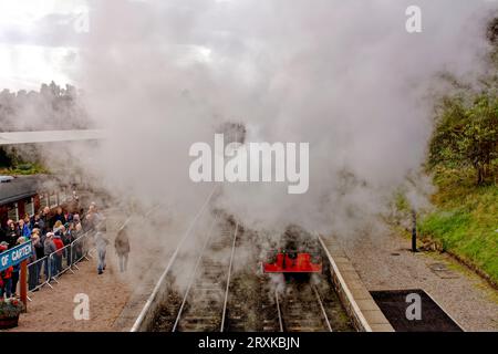 Boat of Garten steam rally smoke steam a crowd of people and the green Bon Accord tank engine Stock Photo