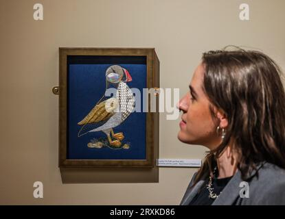 London, UK. 26th Sep, 2023. Treasures of Gold and Silver Wire Exhibition: ‘Puffin and Pinks', by LucyAnn Trill, Royal School of Needlework Credit: Paul Quezada-Neiman/Alamy Live News Stock Photo