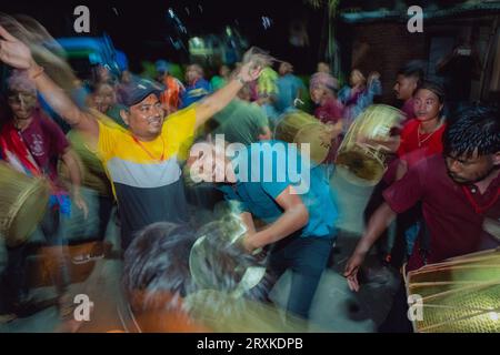 Bhaktapur, Nepal. 22nd Sep, 2023. People dance and celebrate as the members of Choking Ganesh Dhimey Baja Khala complete their music training session in Sipadole, Bhaktapur on September 22, 2023. (Photo by Amit Machamasi/NurPhoto)0 Credit: NurPhoto SRL/Alamy Live News Stock Photo