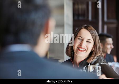 Bartender serving businessman Stock Photo