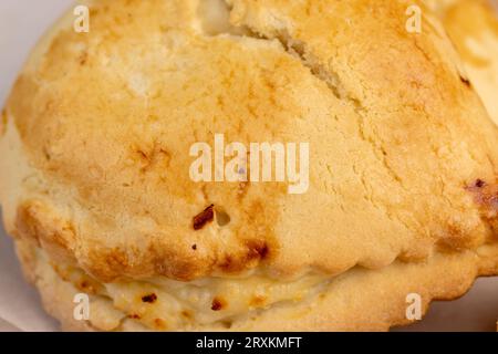 Sweet pastries made of shortbread dough and white cheese fillings, sweet soft curd filling and crispy crumbly dough in a homemade dessert Stock Photo