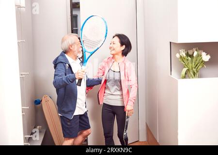Senior couple with tennis racket Stock Photo