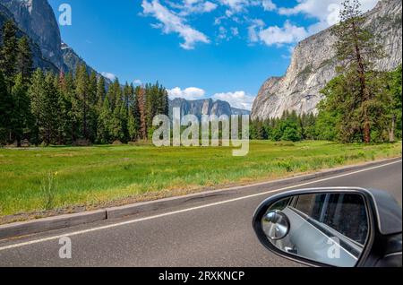 Scenic view of Yosemite Valley with car side-view mirror in foreground, California, USA Stock Photo