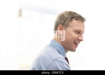 Mature businessman talking during office meeting Stock Photo