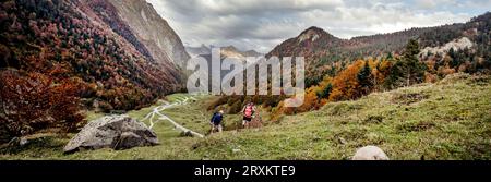 Young couple hiking in mountains Stock Photo