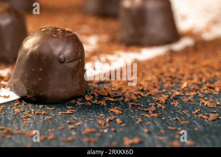 sweet chocolates with soft filling, soft creamy filling candies sprinkled with chocolate pieces Stock Photo