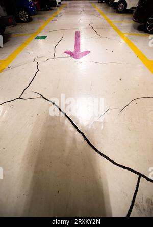 Cracked floor in a parking Stock Photo