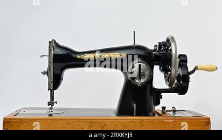 old vintage sewing machine on white background Stock Photo