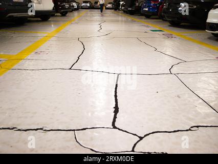 Cracked floor in a parking Stock Photo