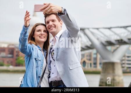 Mid adult couple taking selfie Stock Photo