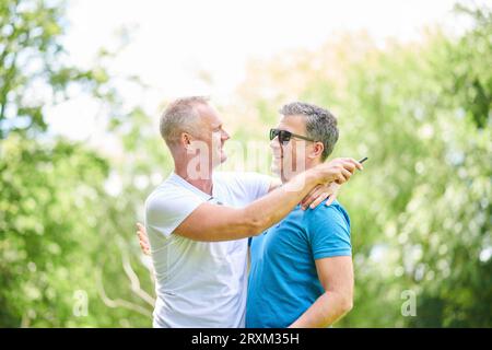 Gay couple hugging Stock Photo