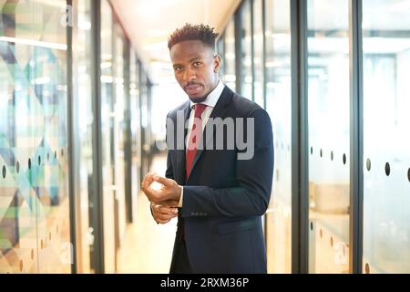 Portrait of young businessman wearing suit Stock Photo