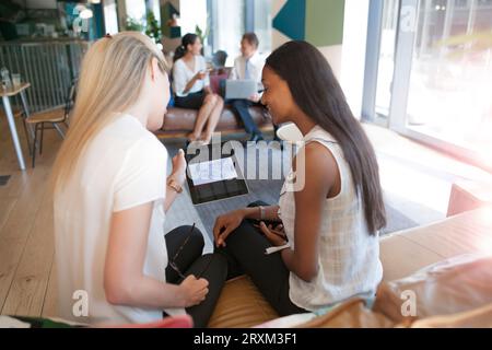 Businesswomen using digital tablet Stock Photo