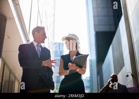 Businesspeople on construction site Stock Photo