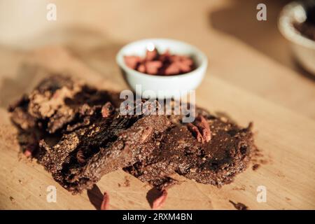 Raw date and pecan slice with goji berries Stock Photo