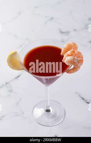 Shrimp cocktail on white marble background Stock Photo