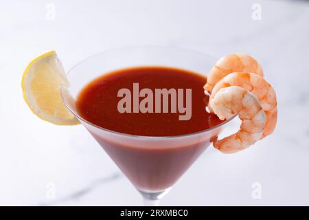 Shrimp cocktail on white marble background Stock Photo
