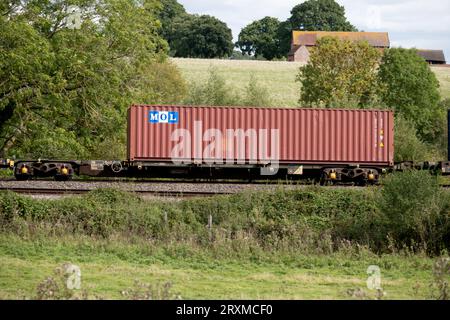 MOL shipping container on a freightliner train, Warwickshire, UK Stock Photo