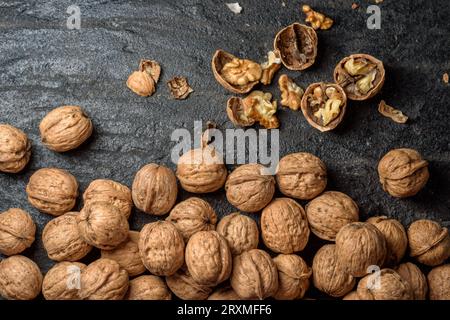 Fresh walnuts on dark background Stock Photo