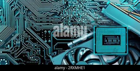 Computer memory, video card and  processor on circuit motherboard background .  Computer components . Stock Photo