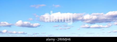 Blue sky with white clouds background panoramic image Stock Photo