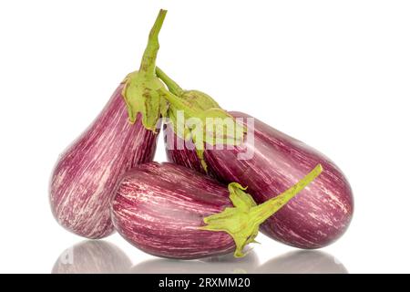 Three organic ripe eggplants, macro, isolated on white background. Stock Photo