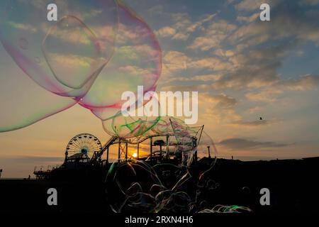 September 28, 2021, Santa Monica, CA, USA: Sunset view of a pier on the California coast with liquid bubbles in the foreground (Credit Image: © Walter G Arce Sr Grindstone Medi/ASP) EDITORIAL USAGE ONLY! Not for Commercial USAGE! Stock Photo