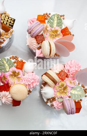 Set of beautiful traditional orthodox cakes decorated with glaze, meringues, chocolate, nuts, toffees, macaroons and jelly Stock Photo