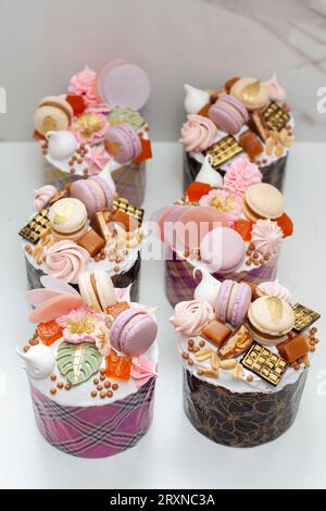 Set of beautiful traditional orthodox cakes decorated with glaze, meringues, chocolate, nuts, toffees, macaroons and jelly Stock Photo