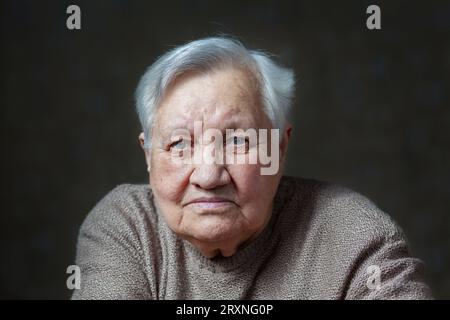 Portrait of an elderly, smile woman in the studio Stock Photo