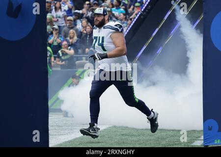 Seattle Seahawks offensive tackle Jake Curhan (74) goes for a block during  an NFL pre-season football game against the Minnesota Vikings, Thursday,  Aug. 10, 2023 in Seattle. (AP Photo/Ben VanHouten Stock Photo 