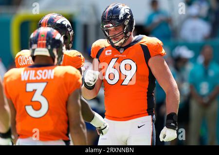 Denver Broncos offensive tackle Mike McGlinchey (69) lines up