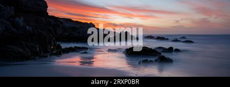 Shore of Walker Bay Nature Reserve at sunset, Western Cape, South Africa Stock Photo