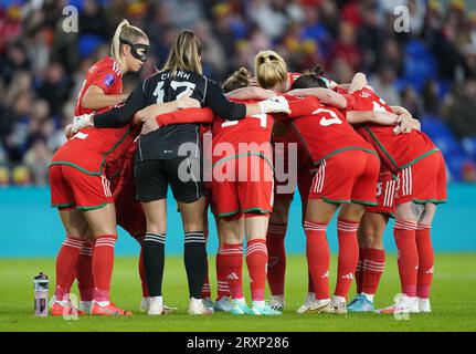 Wales players huddle ahead of the UEFA Women's Nations League Group A3 match at the Cardiff City Stadium, Wales. Picture date: Tuesday September 26, 2023. Stock Photo