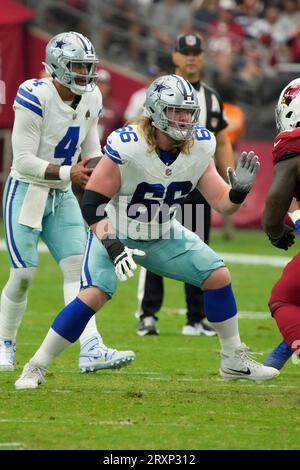 Dallas Cowboys guard T.J. Bass (66) and Las Vegas Raiders guard Netane Muti  (54) meet on