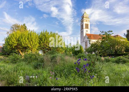 Church and garden of Kehl a town in southwestern Germany along the Rhine river nd border of France in the Ortenaukreis in Baden-Wurttemberg Stock Photo