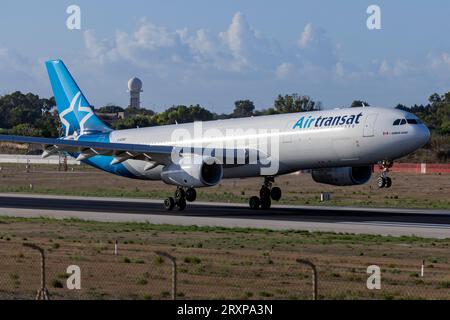 Air Transat Airbus A330-343 (REG: C-GTSD) arriving early morning directly from Canada for maintenance at LTM. Stock Photo