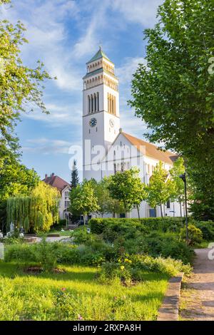 Church and garden of Kehl a town in southwestern Germany along the Rhine river nd border of France in the Ortenaukreis in Baden-Wurttemberg Stock Photo